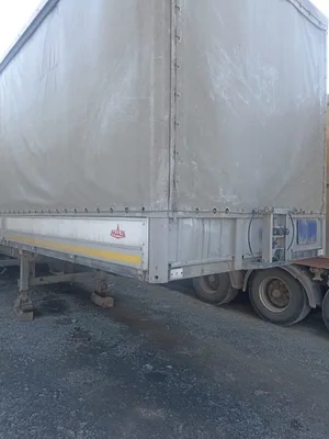 МАЗ 9758* Полуприцеп шторный